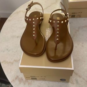 Michael kors tan Niko thong sandals with gold studs